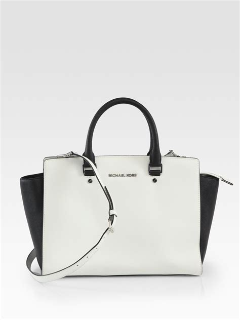 michael kors selma bag white and black|Michael Kors selma satchel.